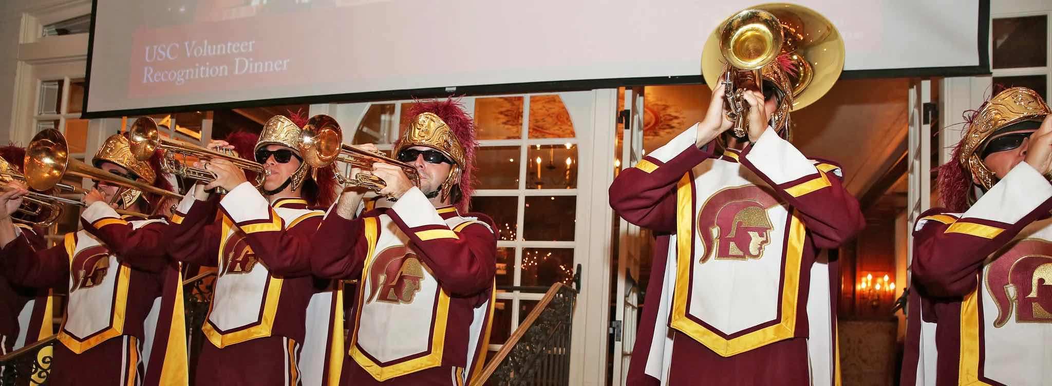 Trojan Marching Band brass players perform at the Volunteer Recognition Dinner