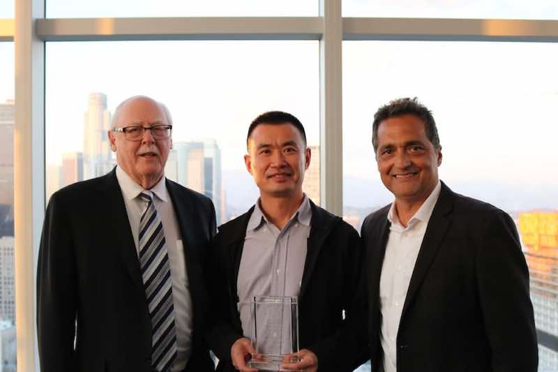 Bill Jia receives an award