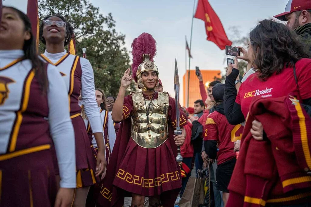 spirit leaders and a woman in a Trojan costume