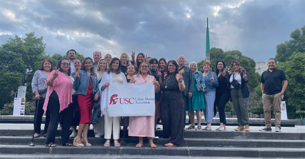 Latino Alumni Association group photo on steps