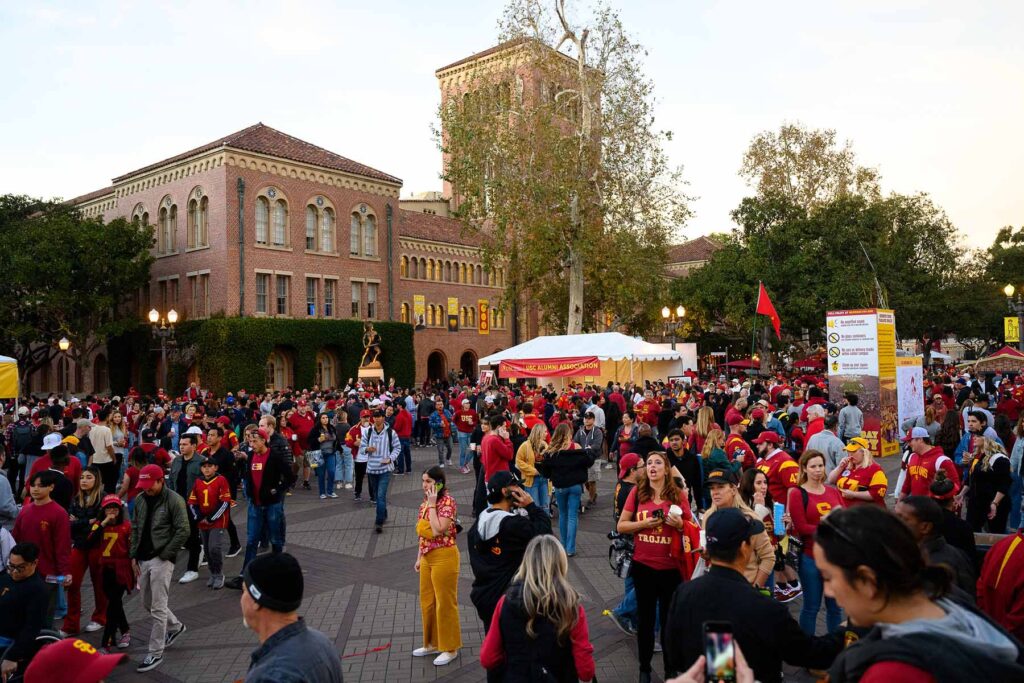 crowd gathers on campus for Homecoming