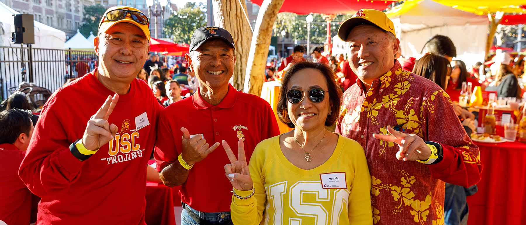 group of asian alumni at an event